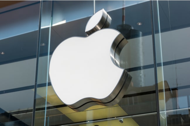Apples logga mot glasvägg.